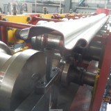 Low cost rolling shutter door forming machine